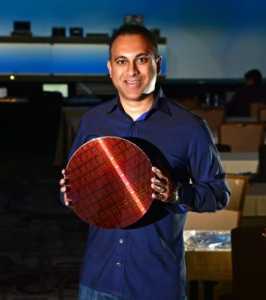 Navin Shenoy displays a wafer containing Intel Xeon processors, April 1, 2019