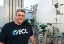 ECL unveils world’s first off-grid, hydrogen-powered AI data center ECL engineer beside hydrogen tanks